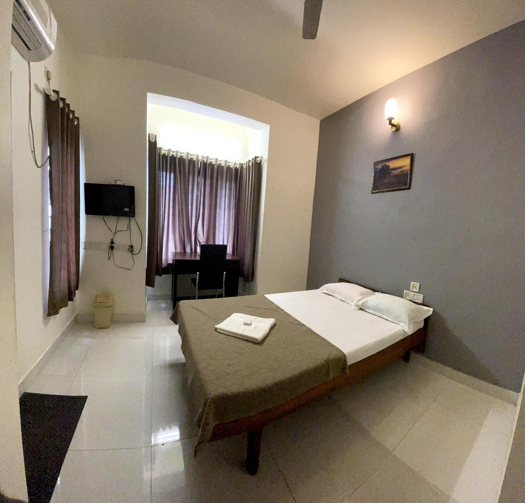 Апартаменти Orkuz Residency Kochi Номер фото