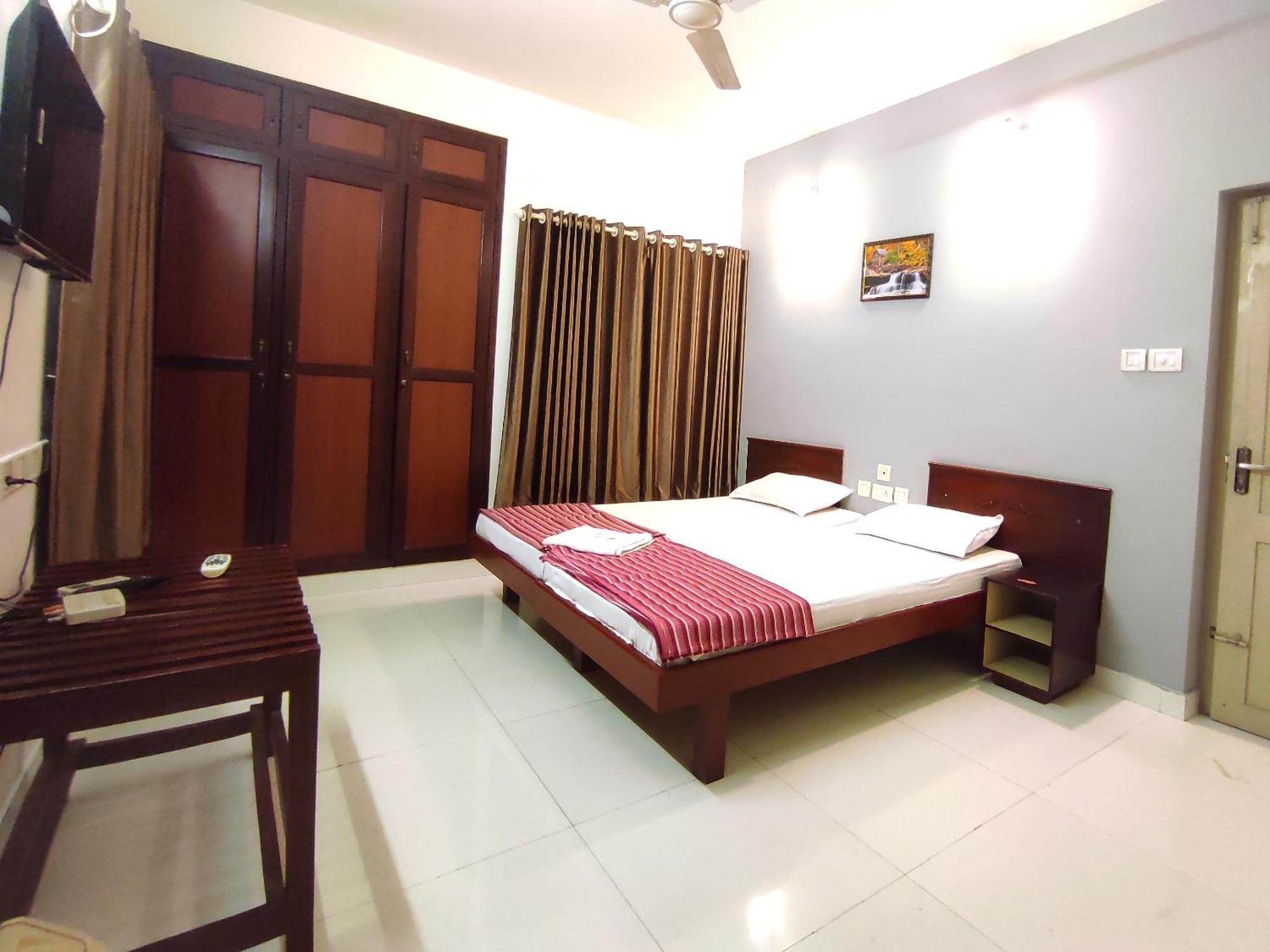 Апартаменти Orkuz Residency Kochi Номер фото