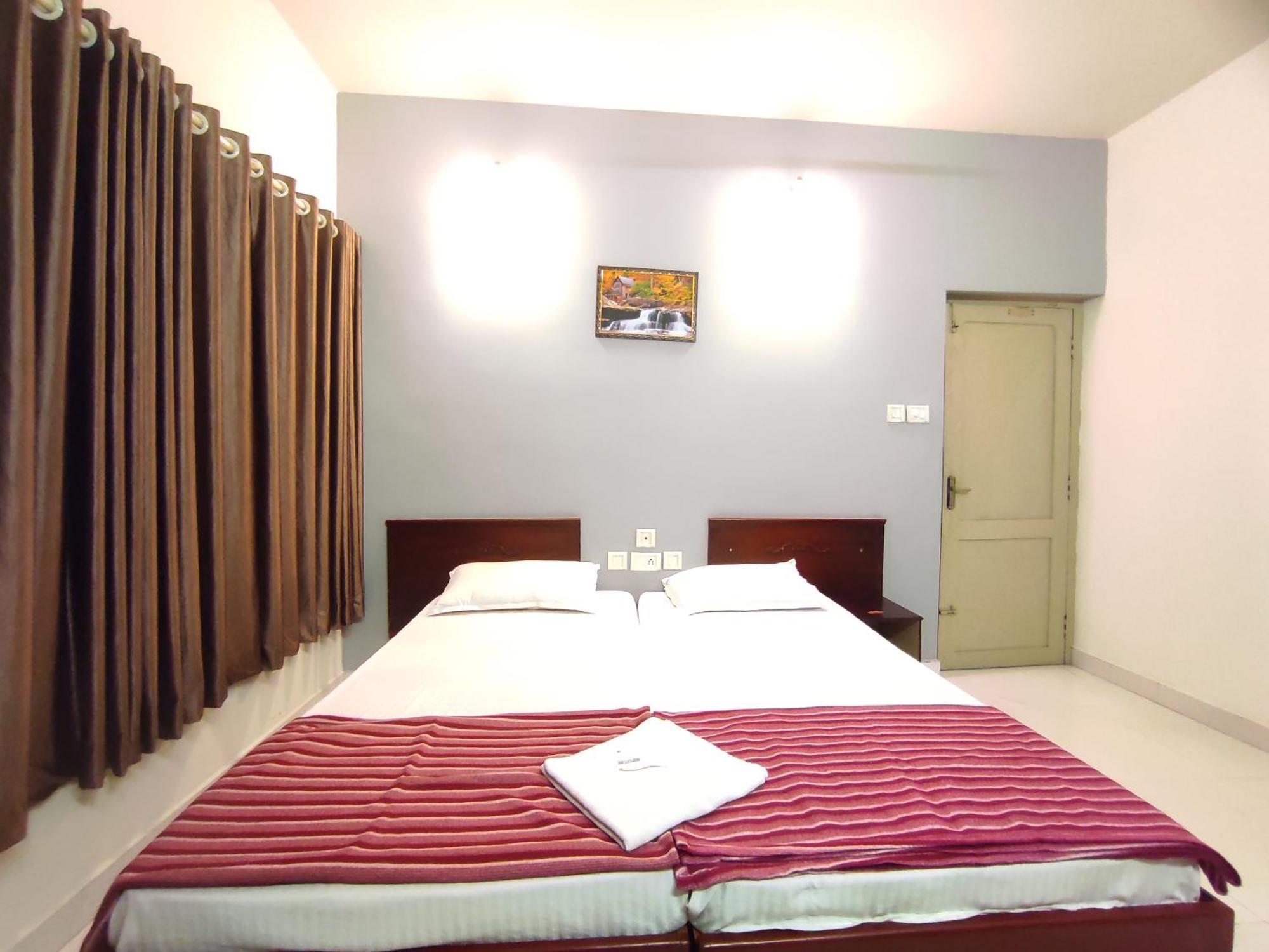 Апартаменти Orkuz Residency Kochi Номер фото